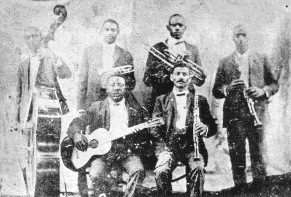The Buddy Bolden Band, New Orleans, ca. 1905. The earliest known jazz photograph. Public domain.